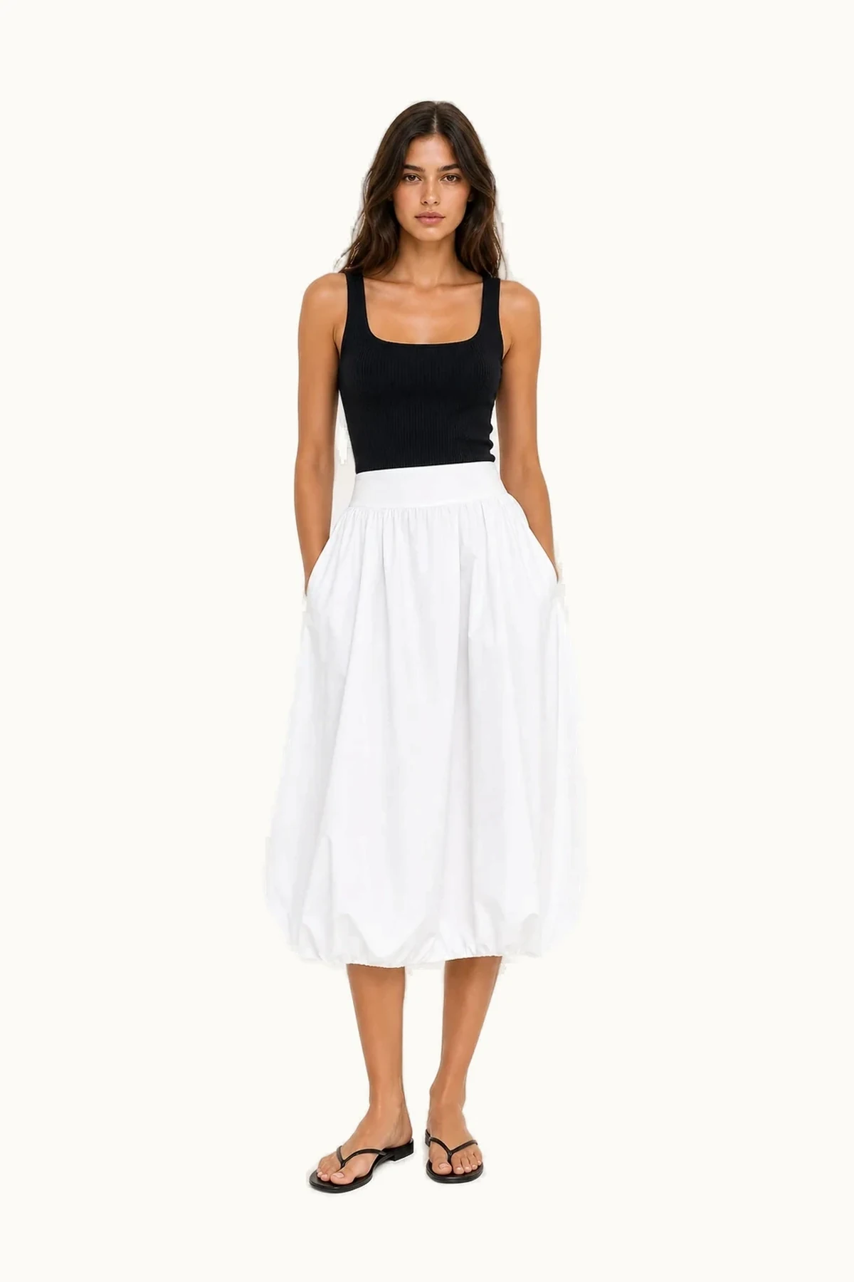 Model wearing the Maelle Poplin Balloon Midi Skirt from the front