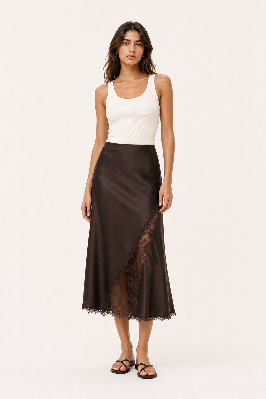 Model wearing the Vesper Satin Lace Midi Skirt from the front