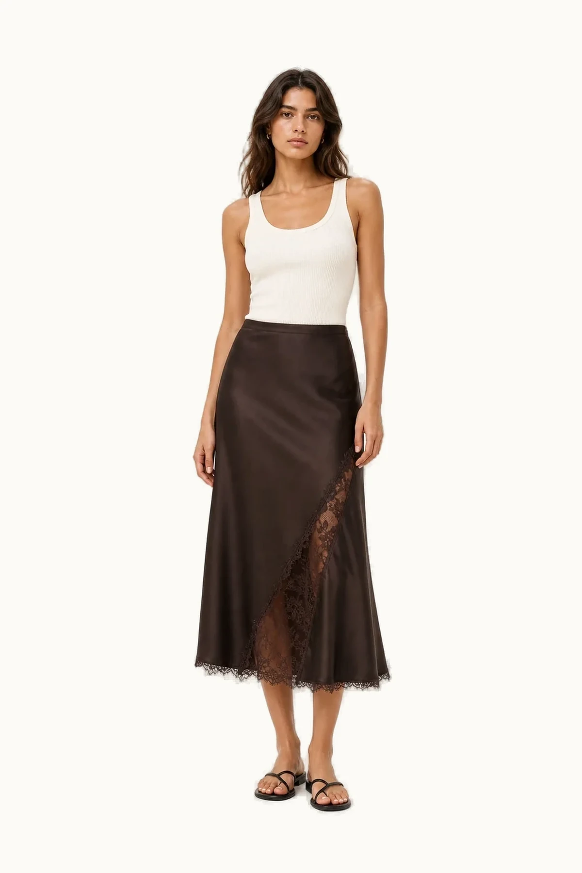 Model wearing the Vesper Satin Lace Midi Skirt from the front